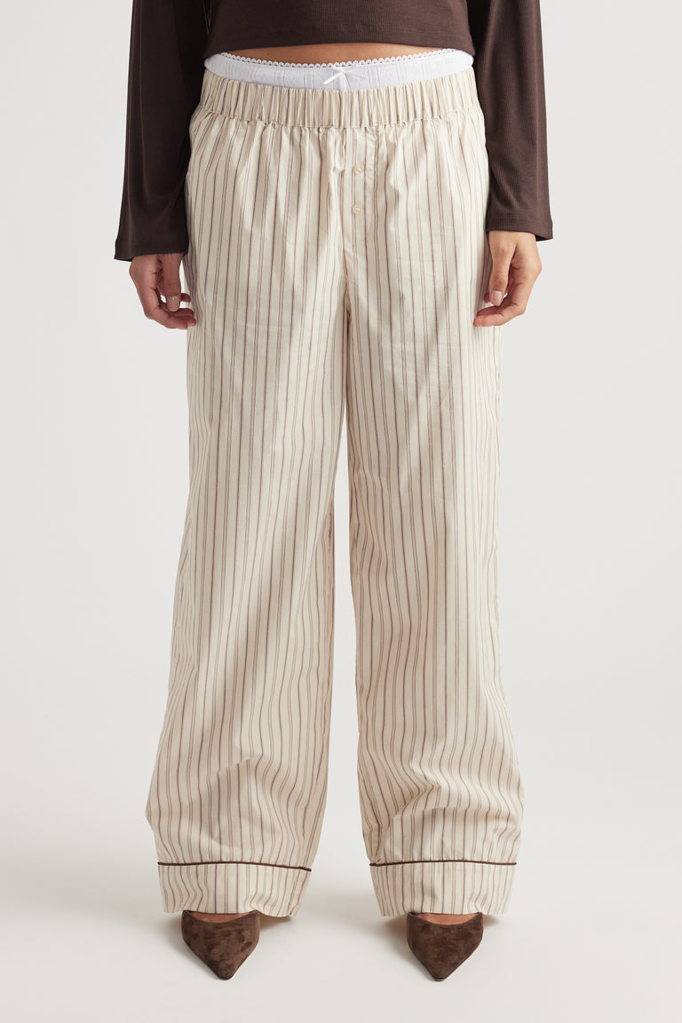 Relaxed fit wide-leg sleep pants in cream with thin vertical chocolate stripes and elastic waistband detail