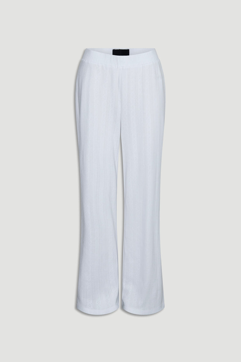 Soft white wide-leg pants crafted from lightweight pointelle knit fabric with a relaxed silhouette and elastic waist waistband
