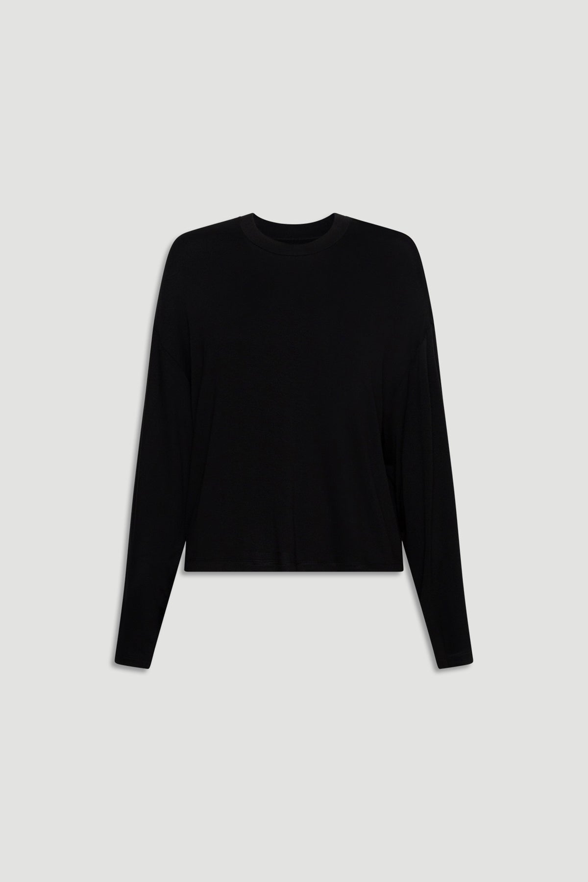 Black long sleeve top in soft jersey fabric with a relaxed fit and simple crew neckline for everyday comfort