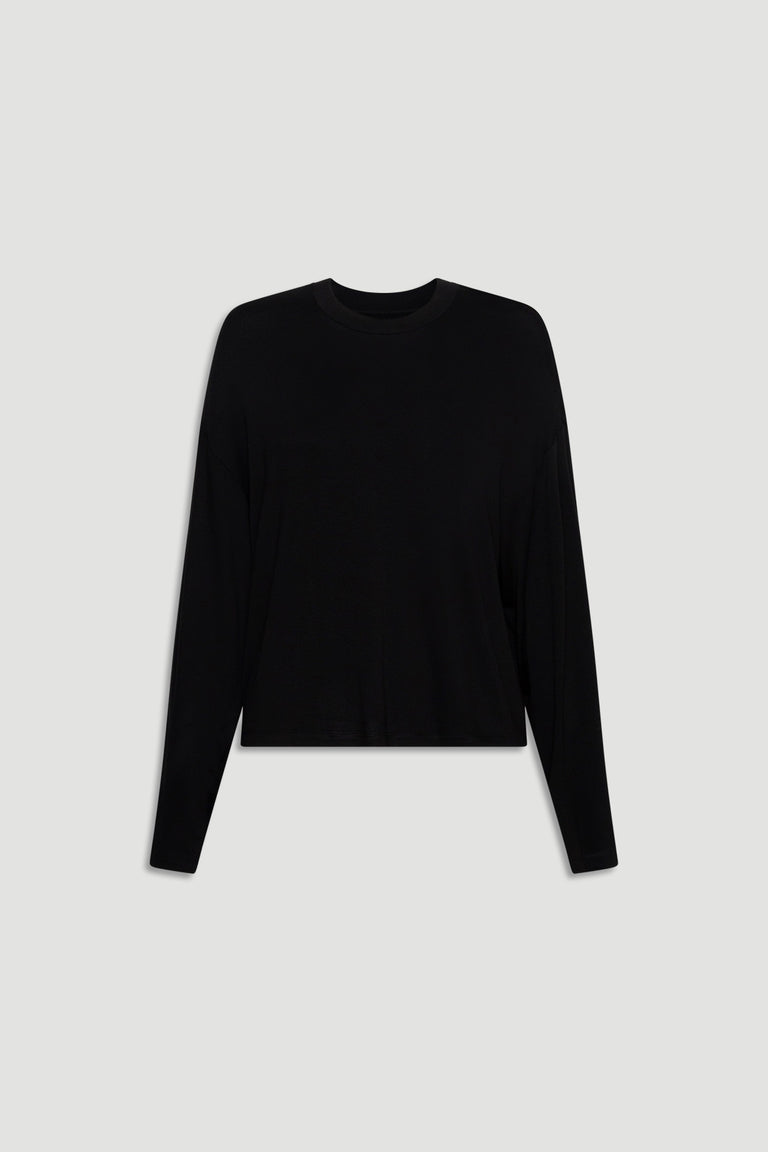 Black long sleeve top in soft jersey fabric with a relaxed fit and simple crew neckline for everyday comfort