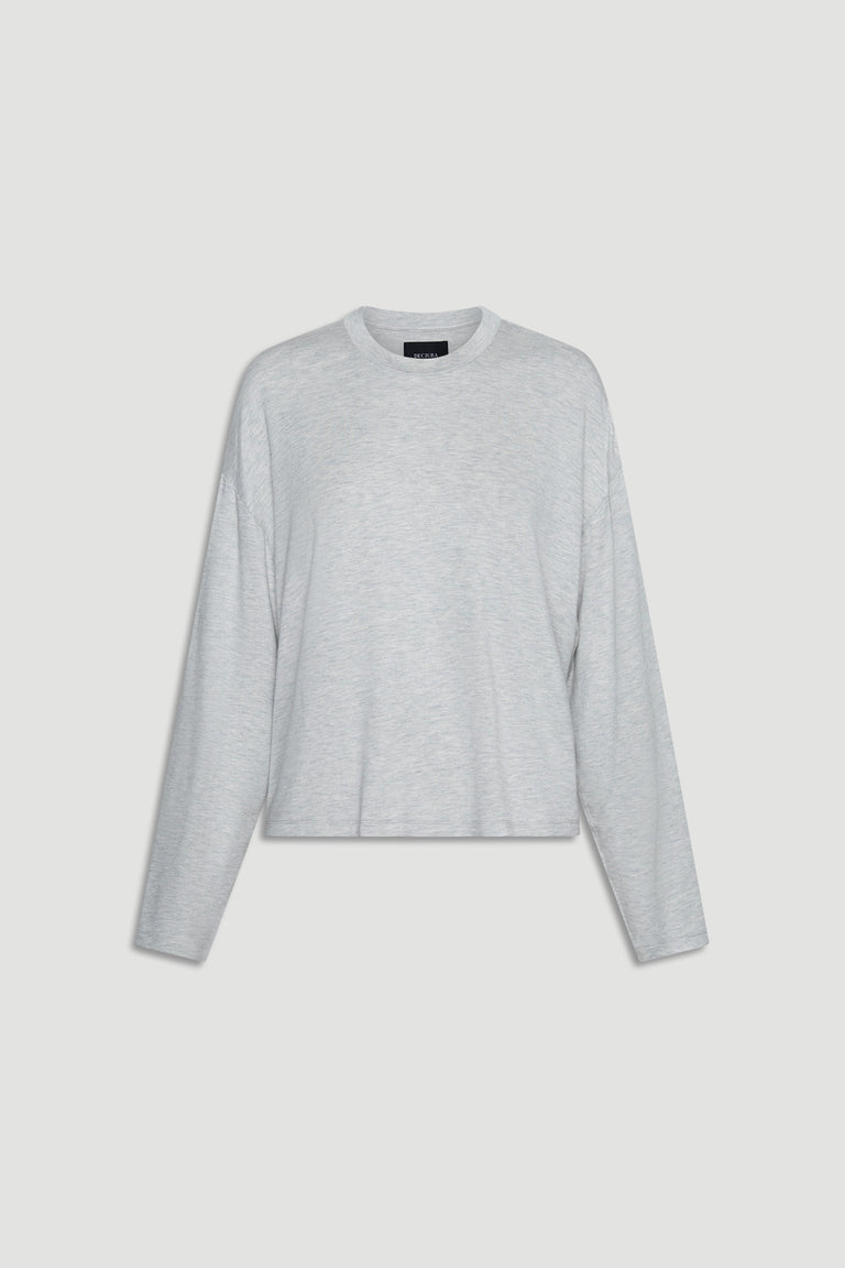 Light grey long sleeve top in soft sleep jersey fabric with relaxed fit and crew neckline design