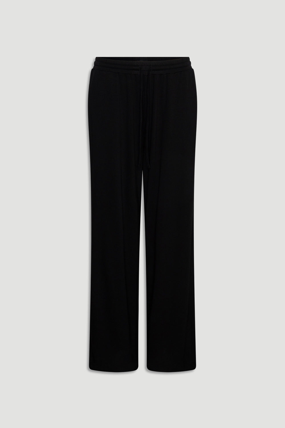 Black wide-leg lounge pants made from soft jersey fabric with an elastic waistband and drawstring detail