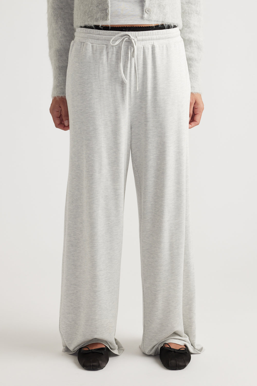 Light grey wide leg pants in soft sleep jersey fabric with drawstring waist and relaxed fit style