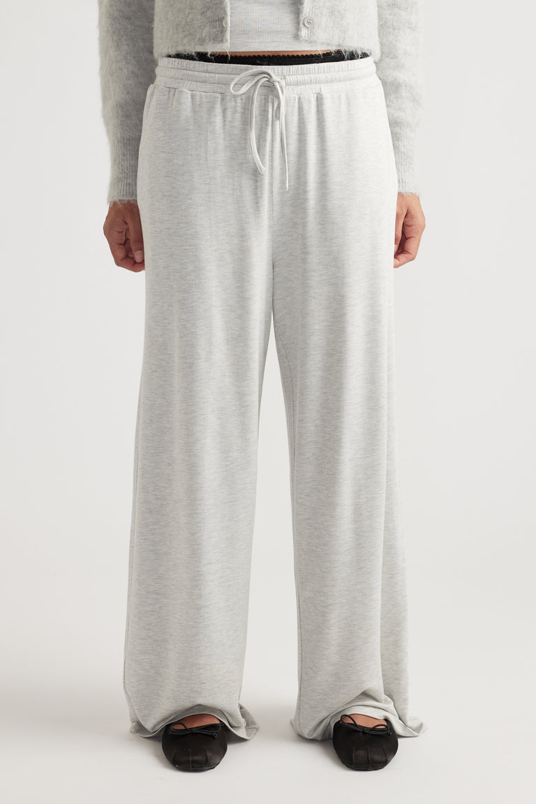 Light grey wide leg pants in soft sleep jersey fabric with drawstring waist and relaxed fit style