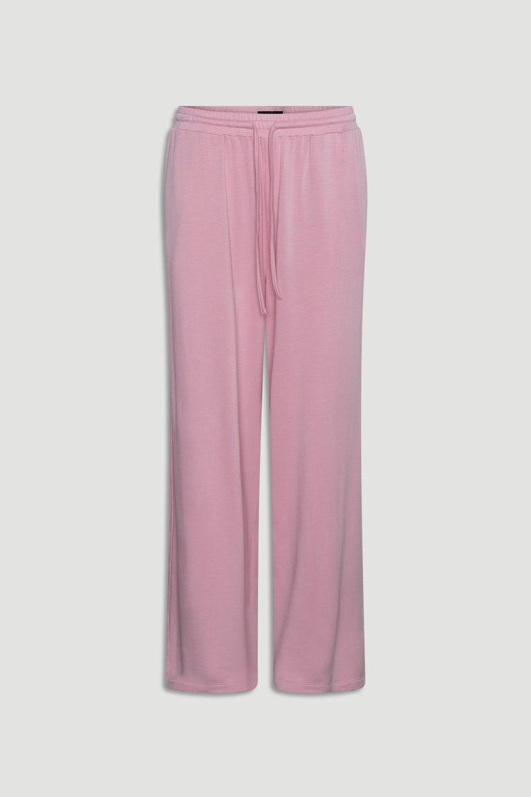 Pink wide leg lounge pants in soft jersey fabric with drawstring waist for relaxed, cozy wear