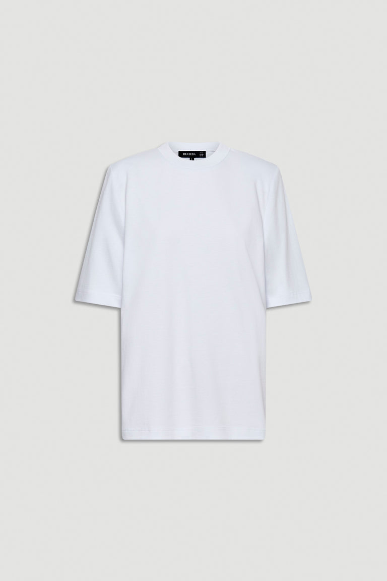 White tee featuring structured shoulder pads and a relaxed fit for an elevated everyday look.