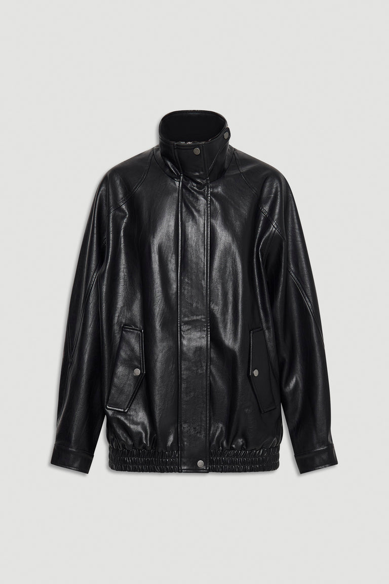 Black oversized jacket with high collar, snap button front, and elasticated hem for a relaxed fit.