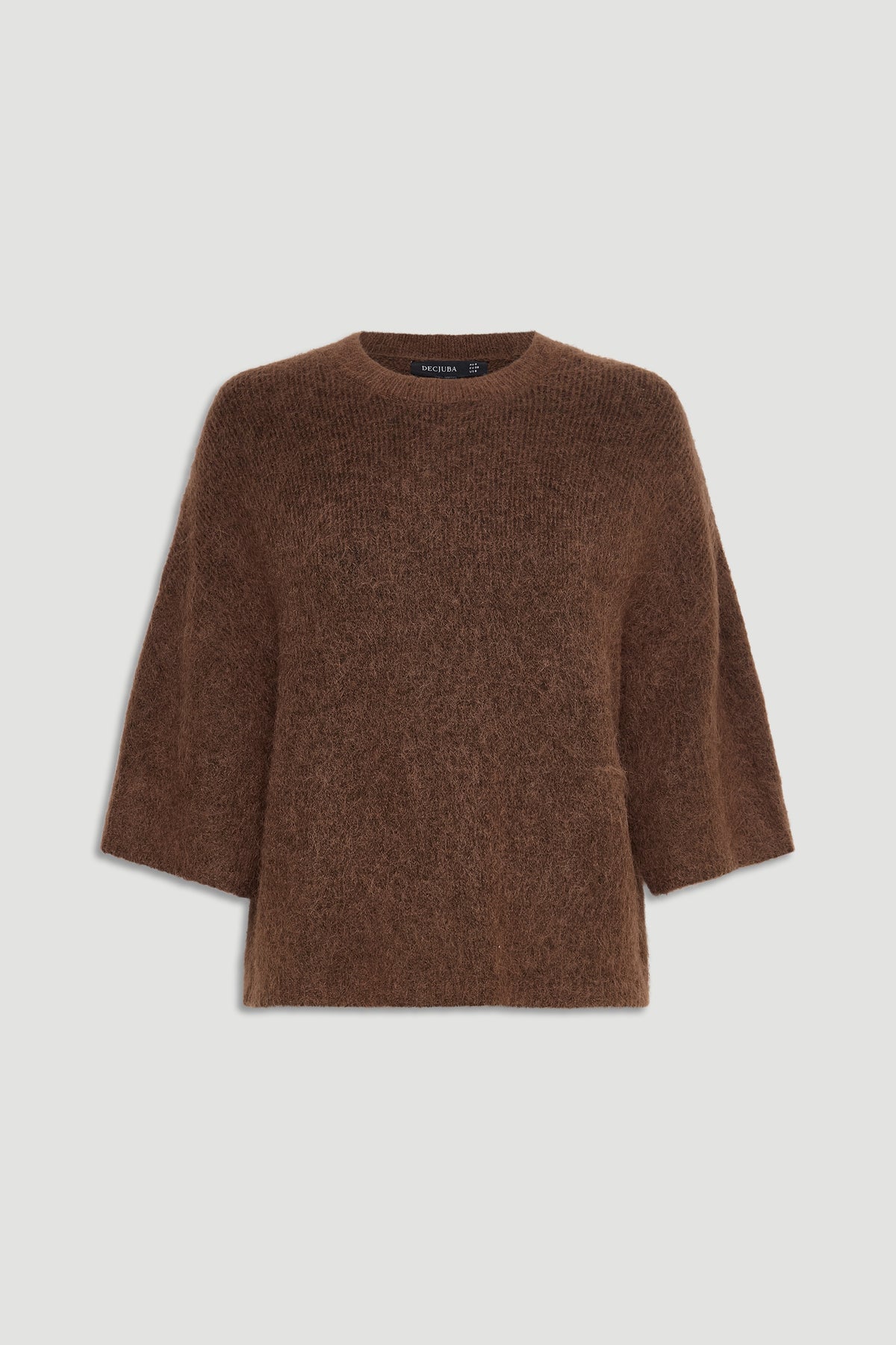 Soft caramel brown fluffy knit top with a relaxed fit and elbow-length sleeves, styled for everyday comfort.