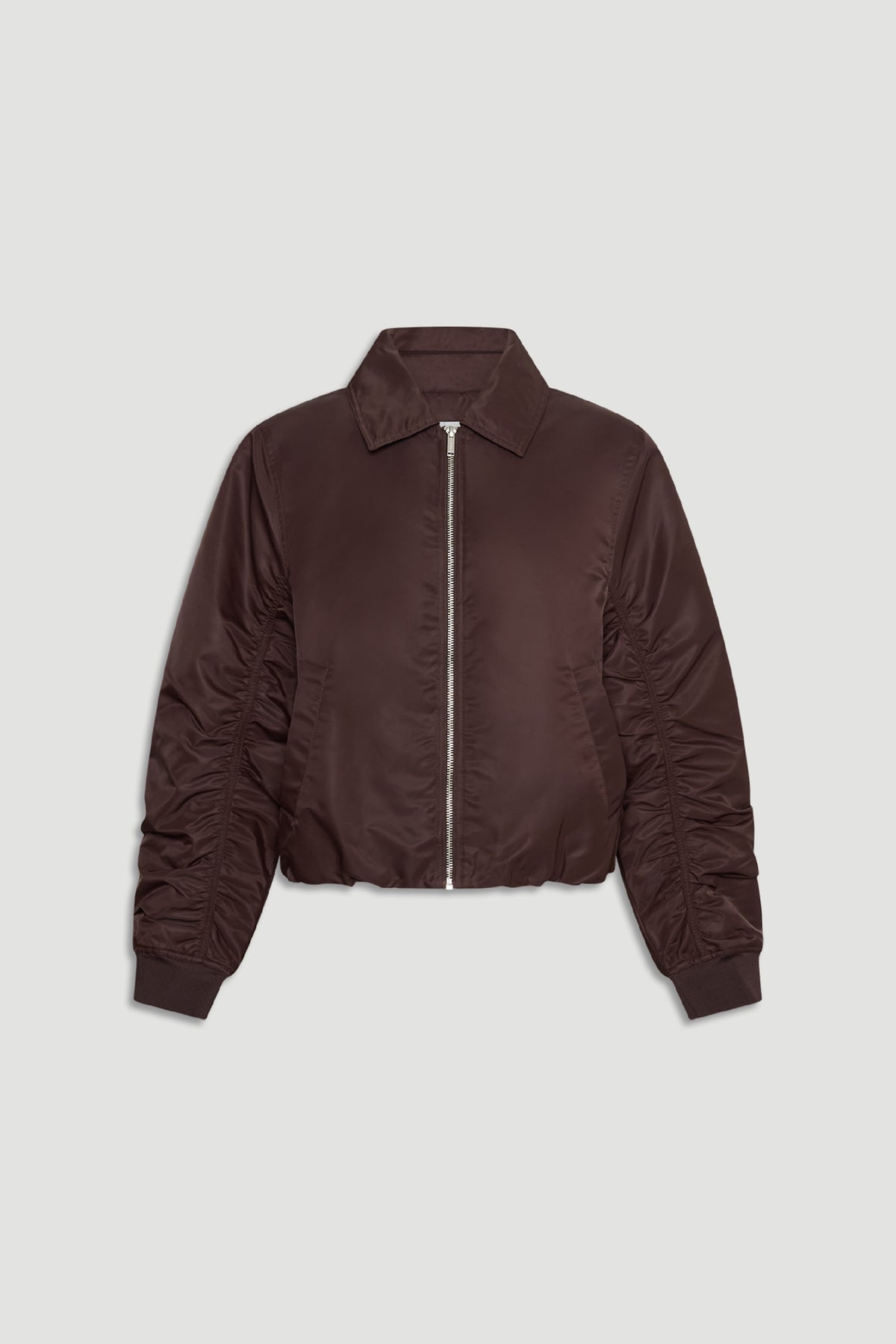 D-Luxe Collared Bomber Jacket in rich cocoa brown with ruched sleeves and silver front zip for modern, versatile layering
