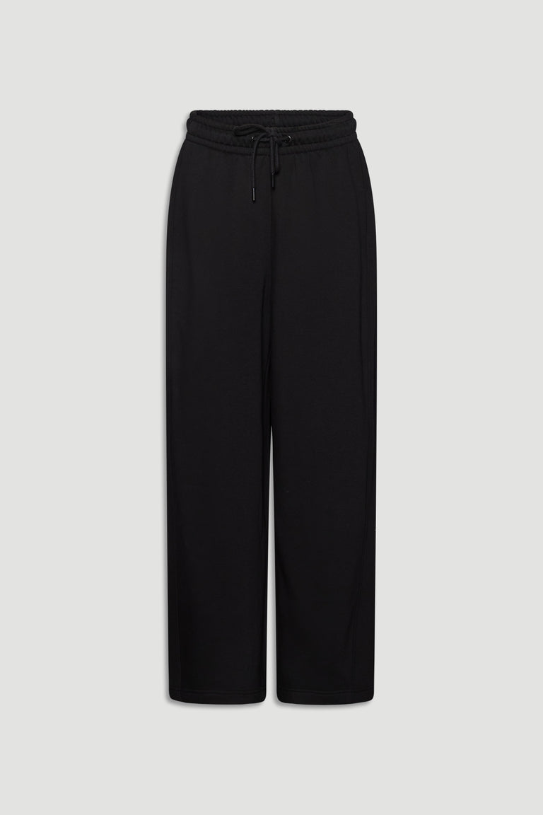 Black relaxed-fit barrel track pants with an adjustable drawstring waist for comfortable everyday wear