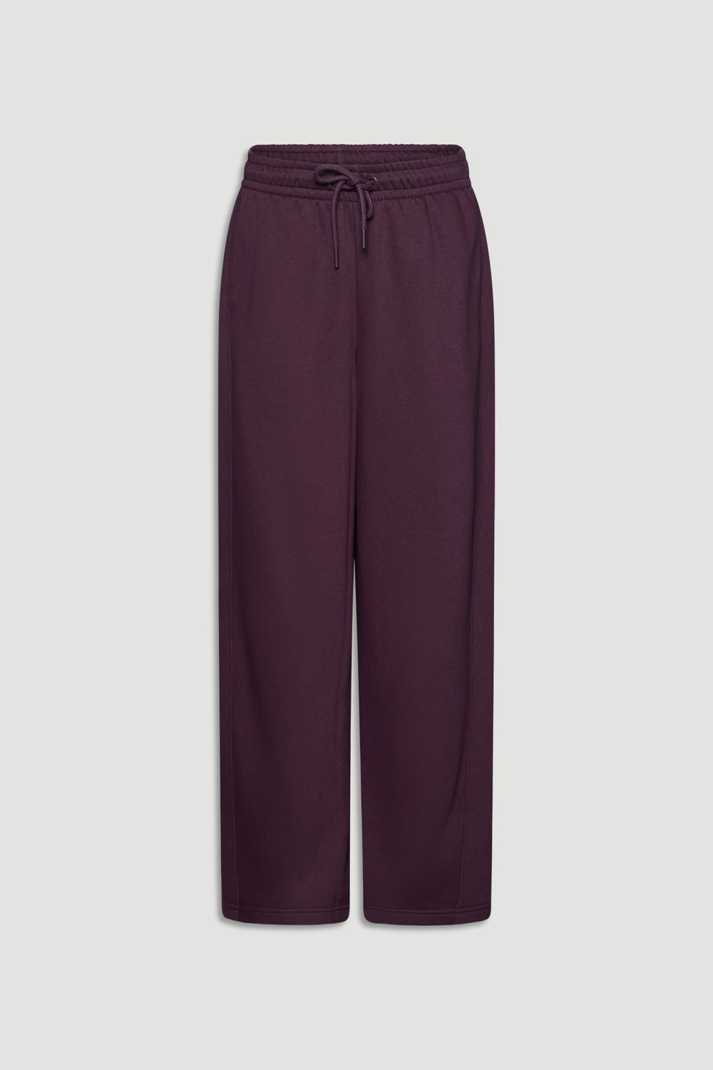 Deep burgundy barrel track pants with an elastic waistband and drawstring for a relaxed, stylish fit
