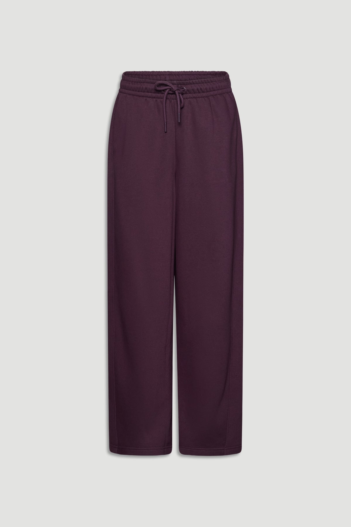 Deep burgundy barrel track pants with an elastic waistband and drawstring for a relaxed, stylish fit