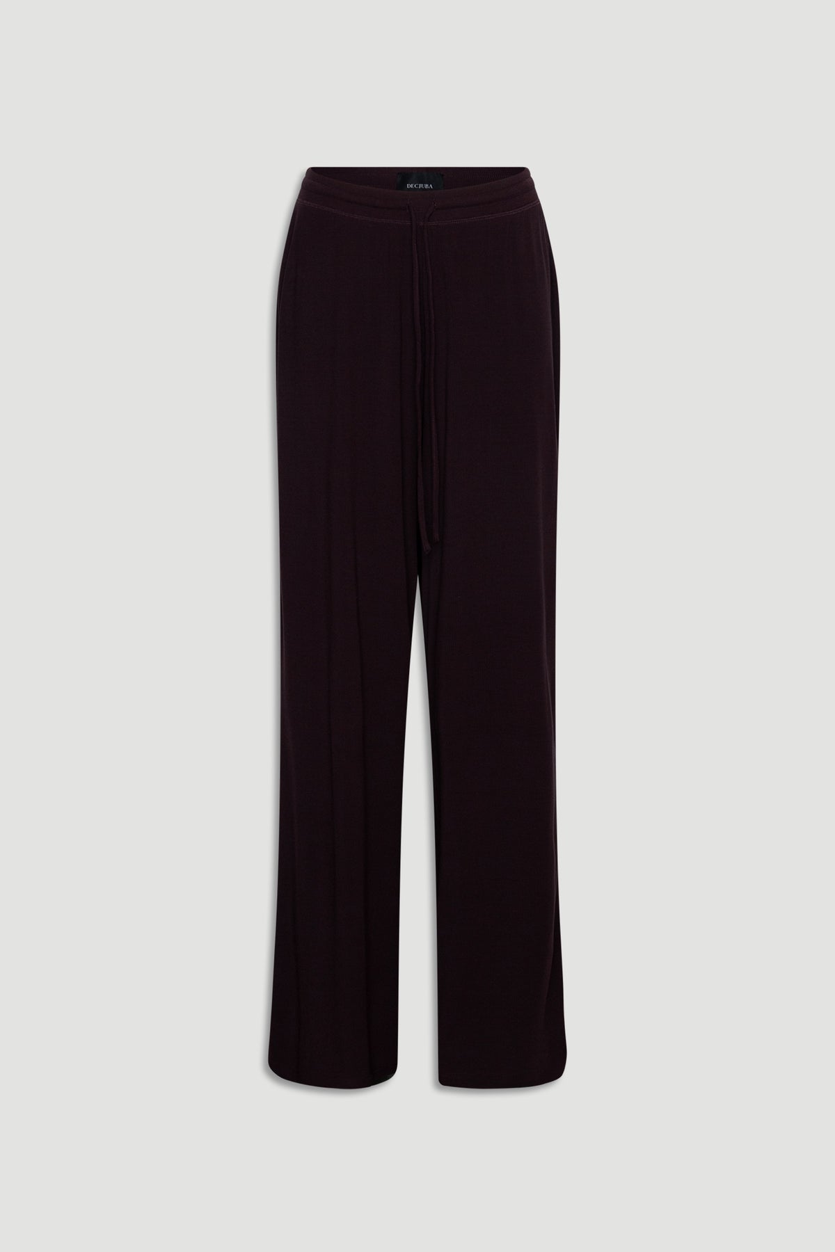 Soft ribbed wide leg pants in deep rhubarb color with an elasticated waistband and drawstring detail for relaxed comfort