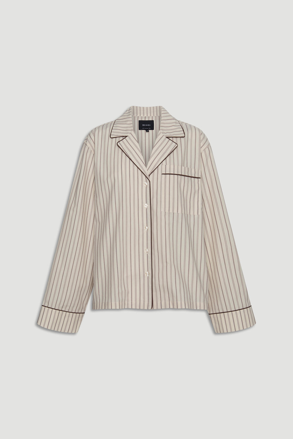 Light beige sleep woven long sleeve shirt with thin brown vertical stripes and contrasting piping on collar, pocket, and cuffs for a refined look