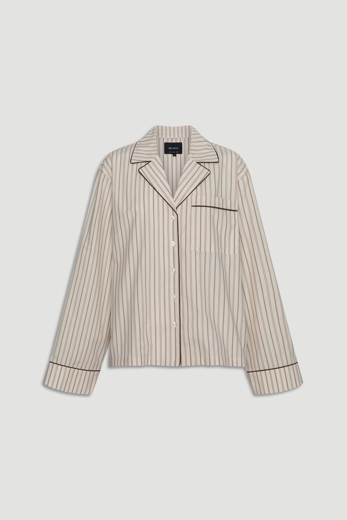 Light beige sleep woven long sleeve shirt with thin brown vertical stripes and contrasting piping on collar, pocket, and cuffs for a refined look