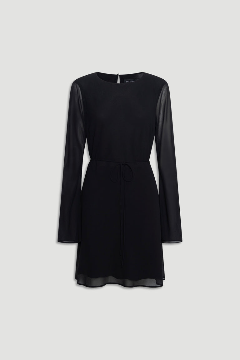 Chelsea Georgette Mini Dress in black featuring sheer long sleeves, tie waist, and a lightweight, flowing fabric design.