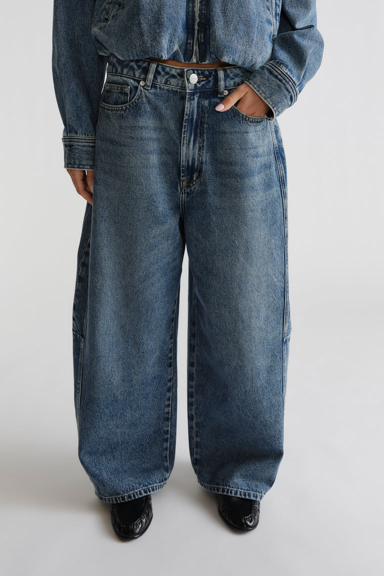 D-Luxe Barrel Jean in classic blue denim with a high waist and wide-leg silhouette by DECJUBA Australian fashion brand