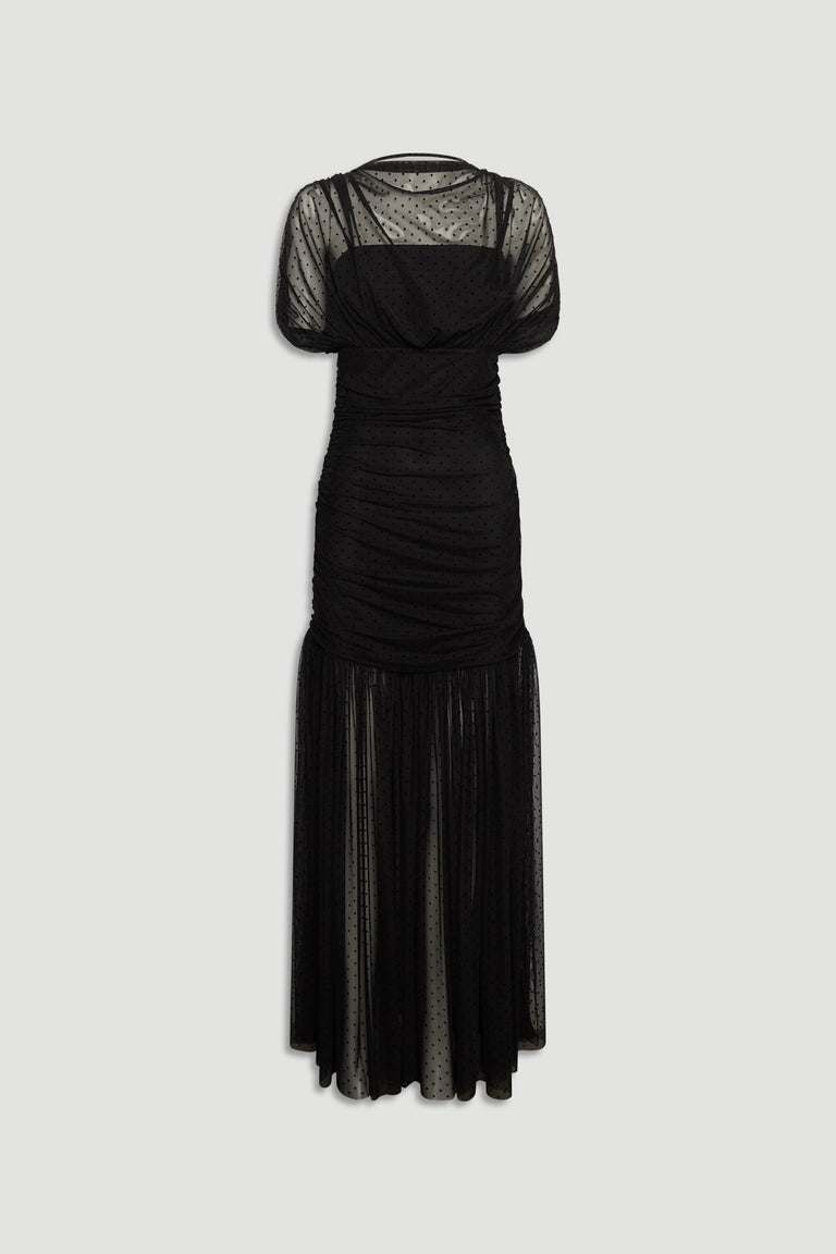 Black mesh maxi dress featuring ruched midsection, sheer puff sleeves, and a flowing dotted tulle skirt.