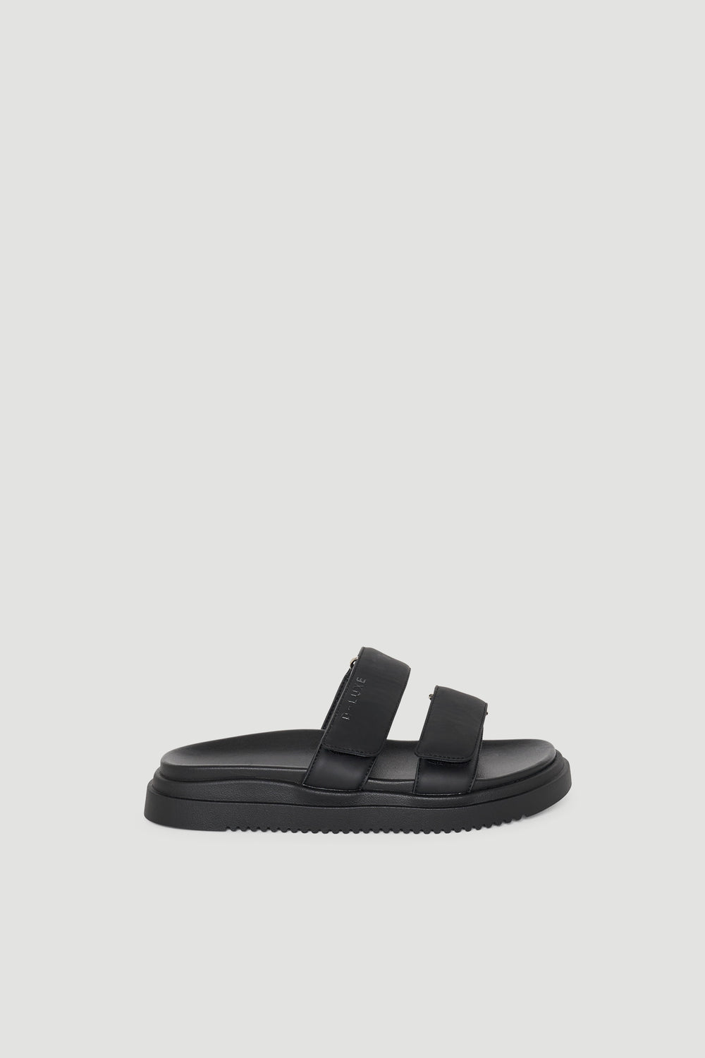 Black slip-on slide sandal with two wide adjustable straps and a cushioned sole for everyday comfort