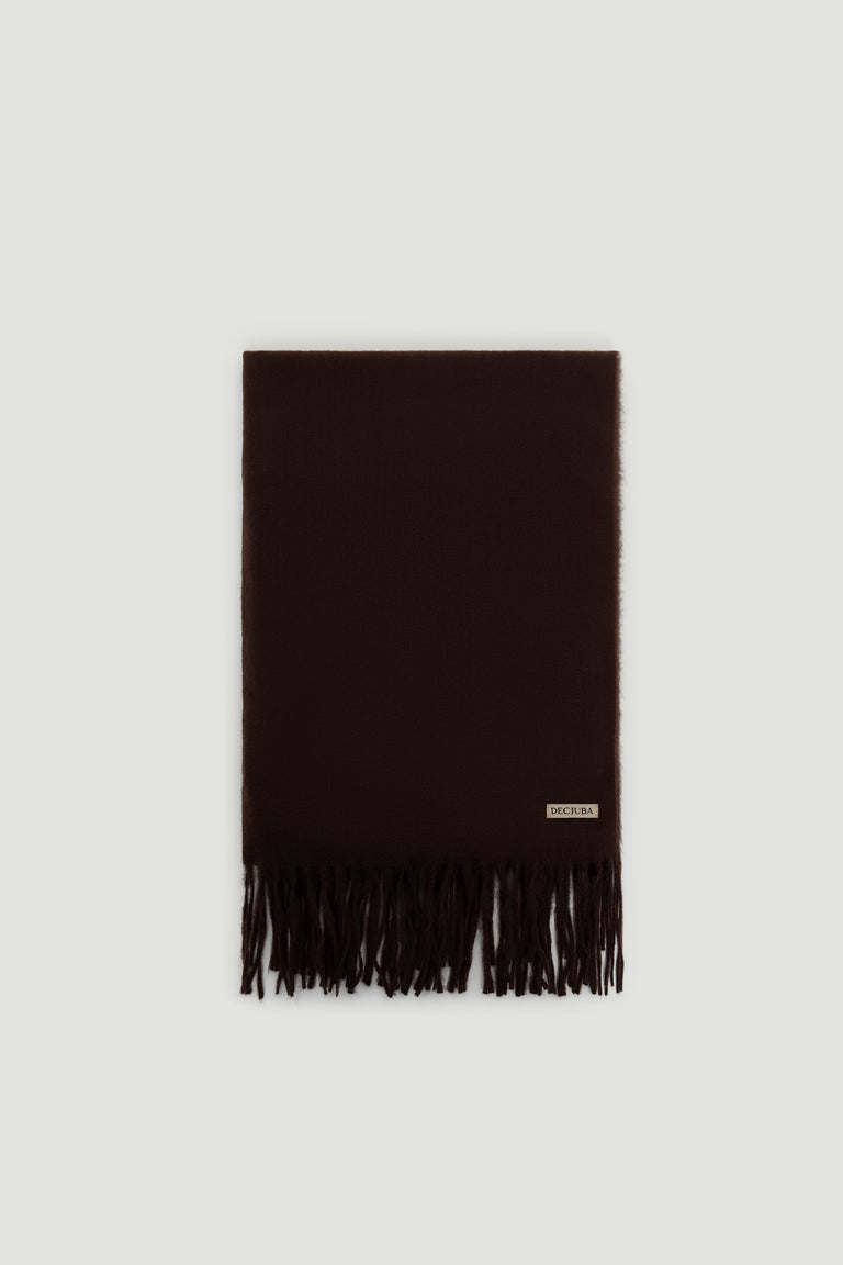 Dark chocolate solid scarf with soft texture and fringed ends, featuring a small branded label near the edge