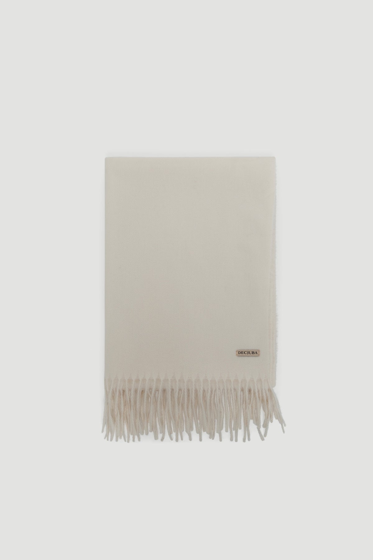 Cream-colored scarf with soft fringed edges and subtle brand logo for a timeless, elegant accessory.