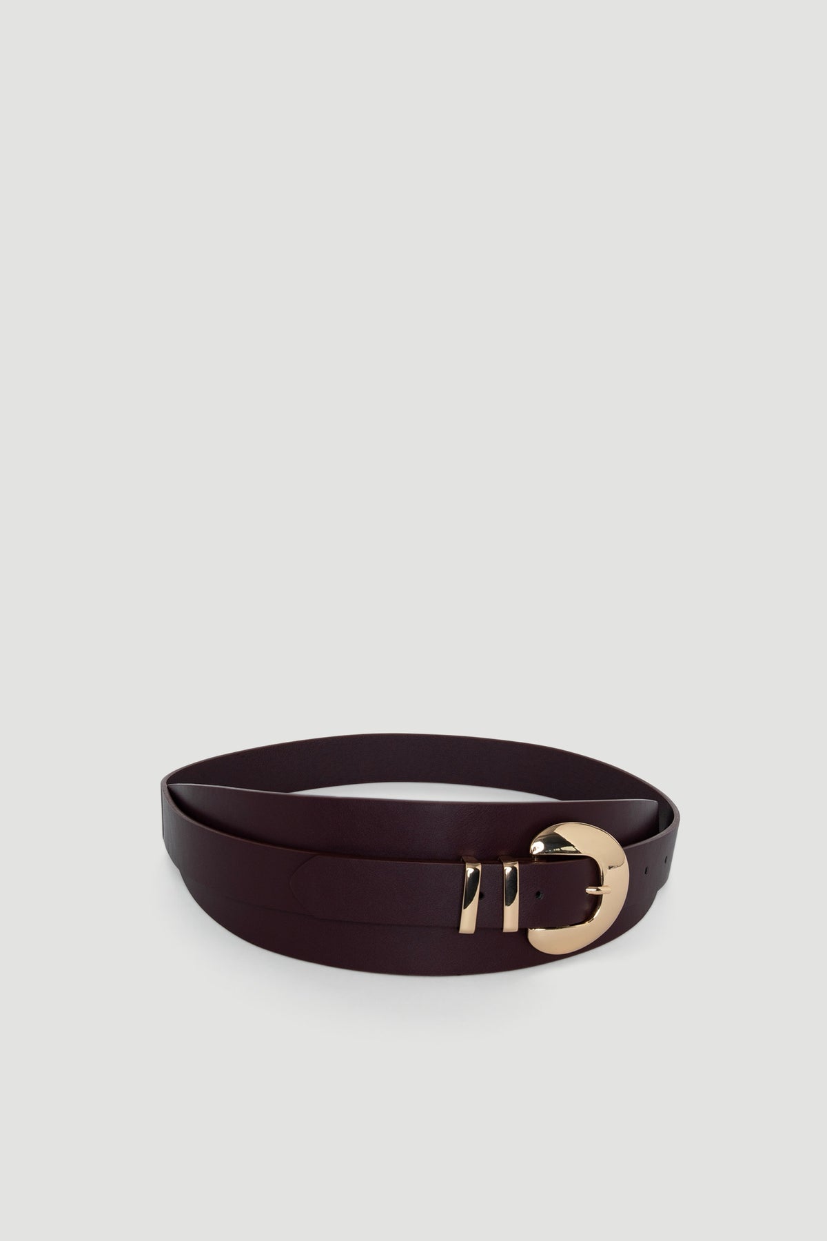 Vicci Wrap Belt in deep burgundy leather with a bold rounded gold buckle for a chic, versatile look by DECJUBA