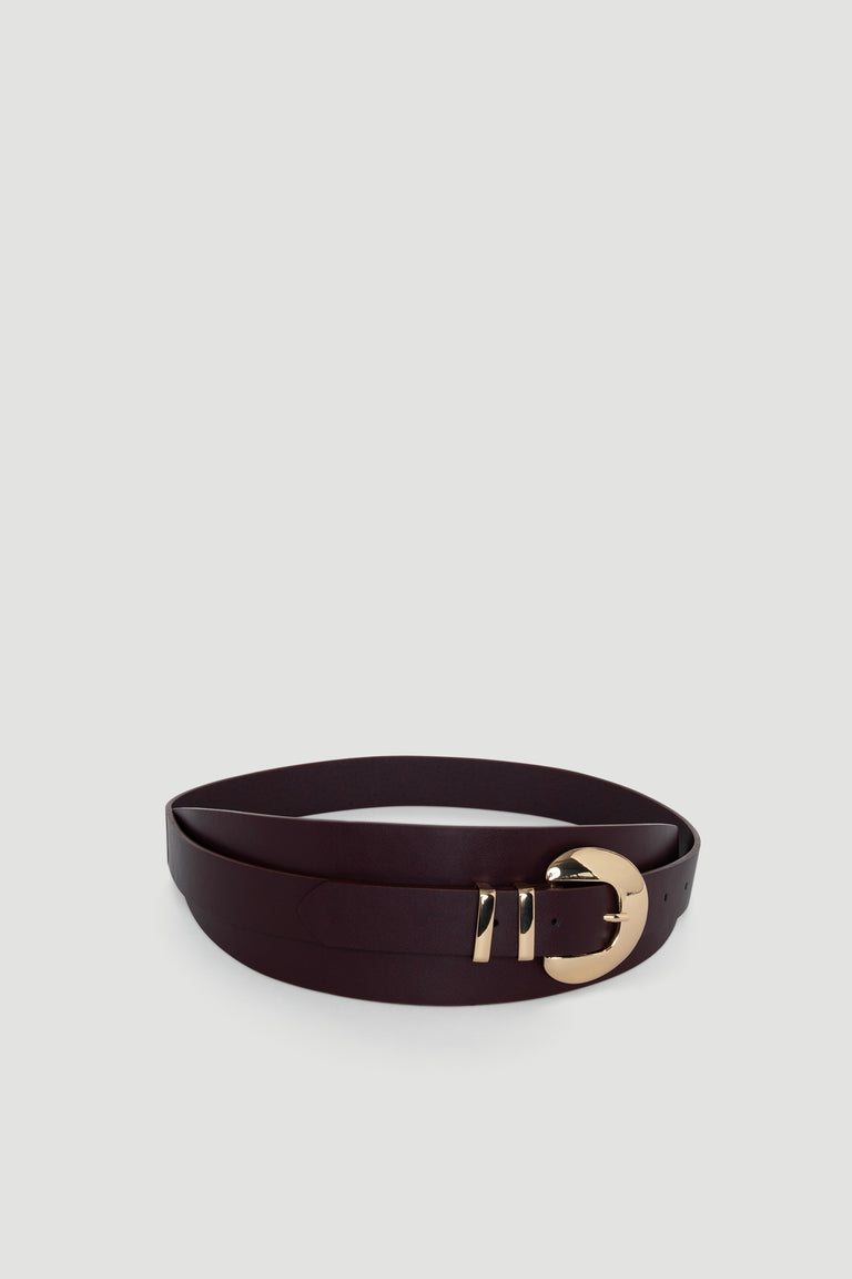 Vicci Wrap Belt in deep burgundy leather with a bold rounded gold buckle for a chic, versatile look by DECJUBA