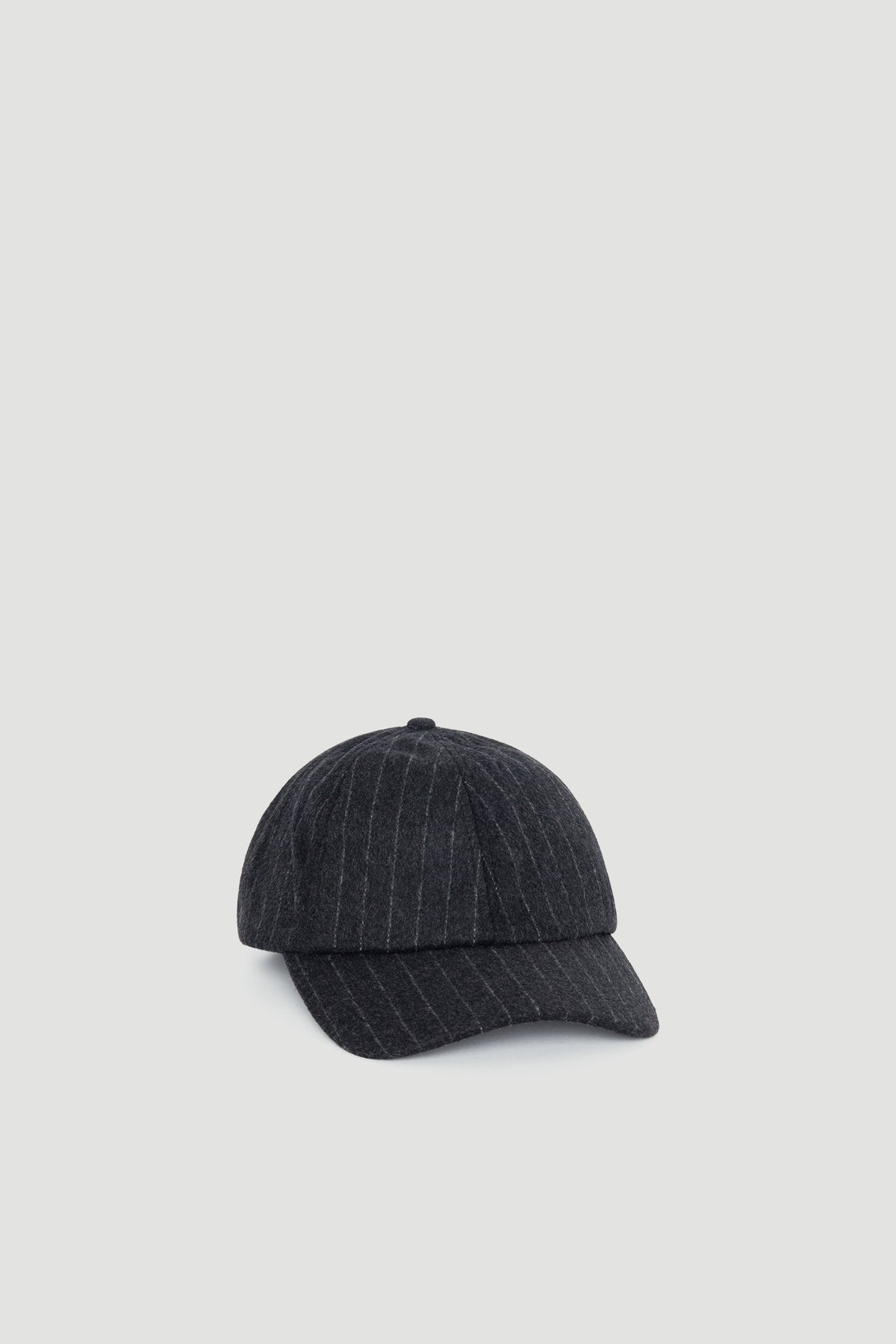 Taylor Stripe Baseball Cap in dark fabric with subtle pinstripe detailing for a refined casual look by DECJUBA