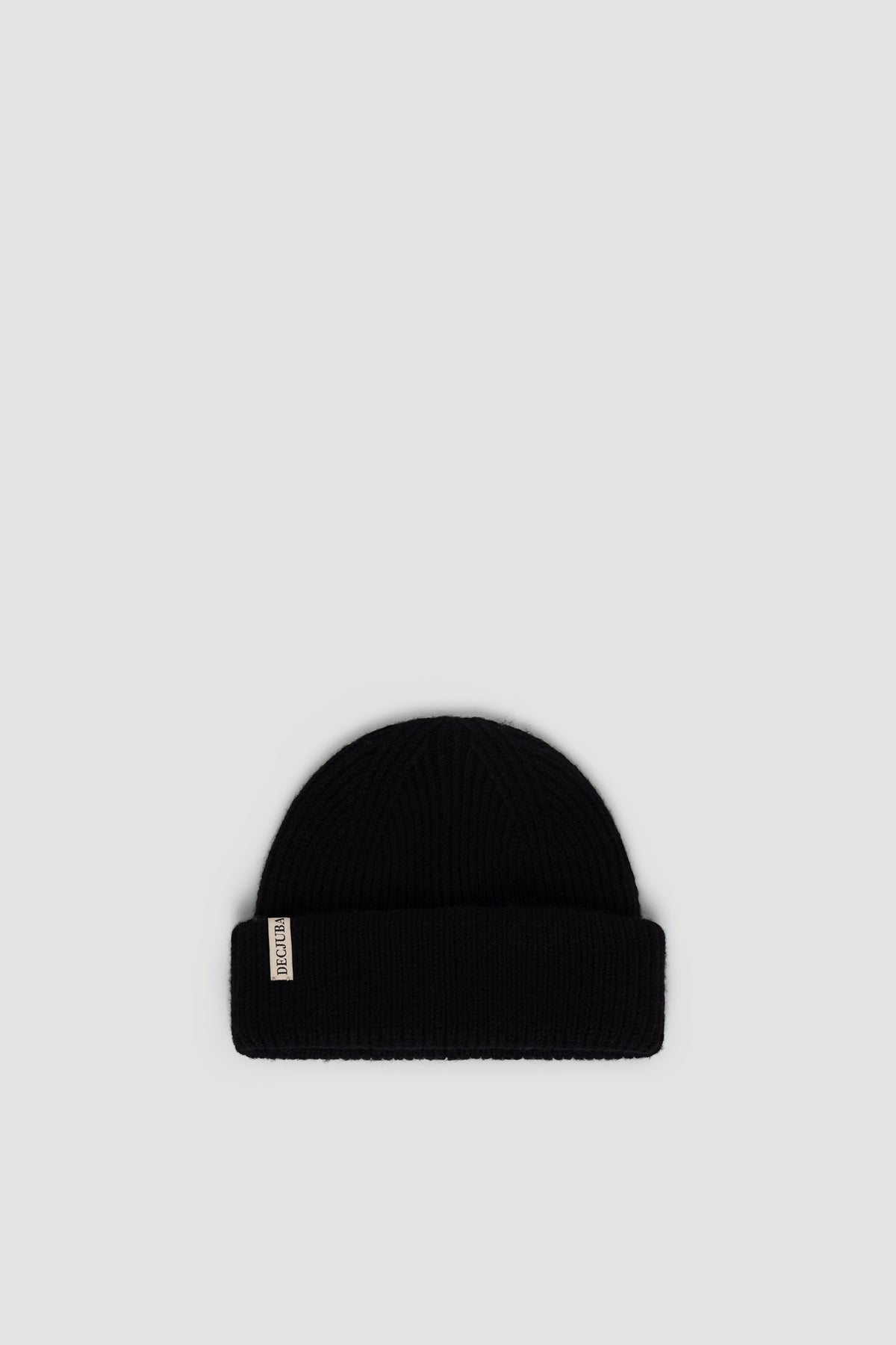 Black ribbed knit beanie with a folded cuff and subtle branded tag for everyday versatile style.