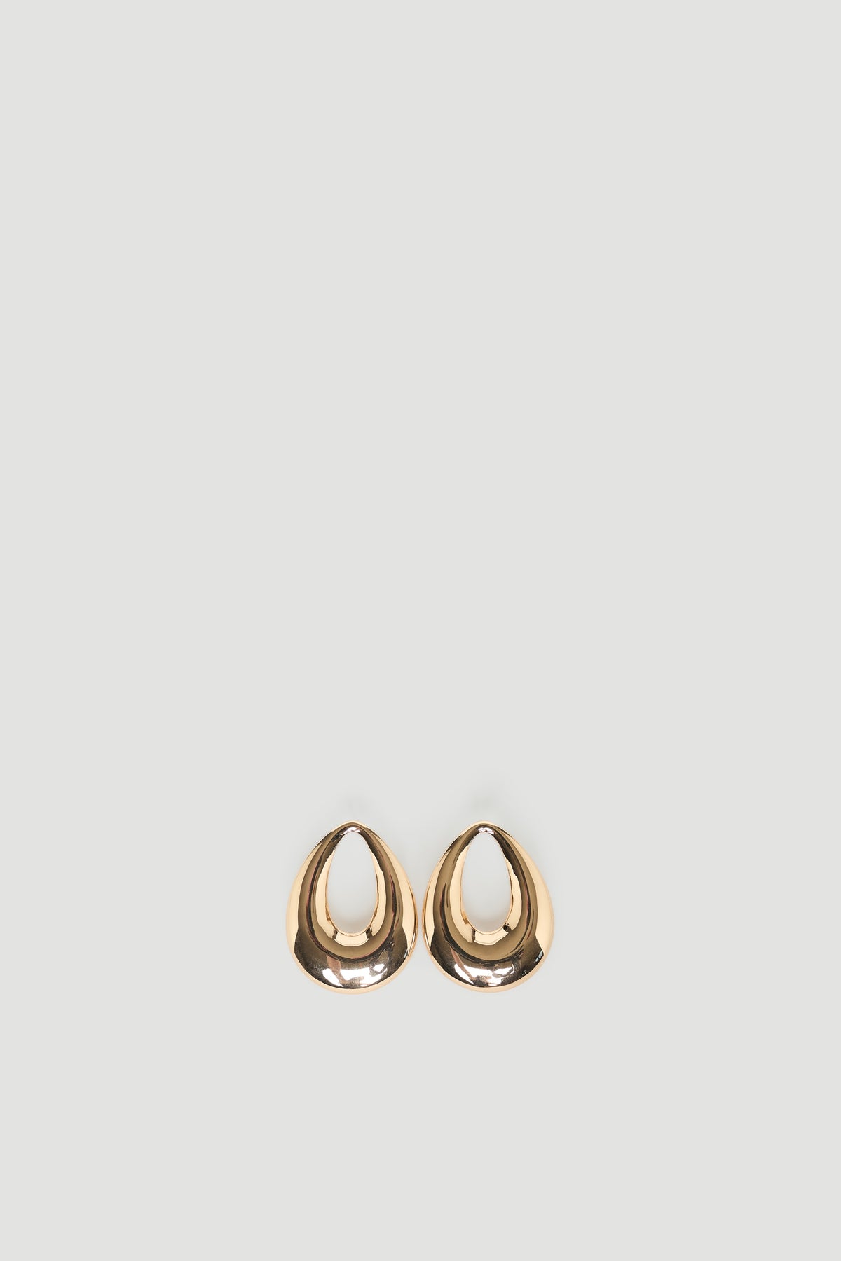 Margot Statement Earrings in polished gold-tone with sculptural drop design, elegant and versatile by DECJUBA Australian fashion brand