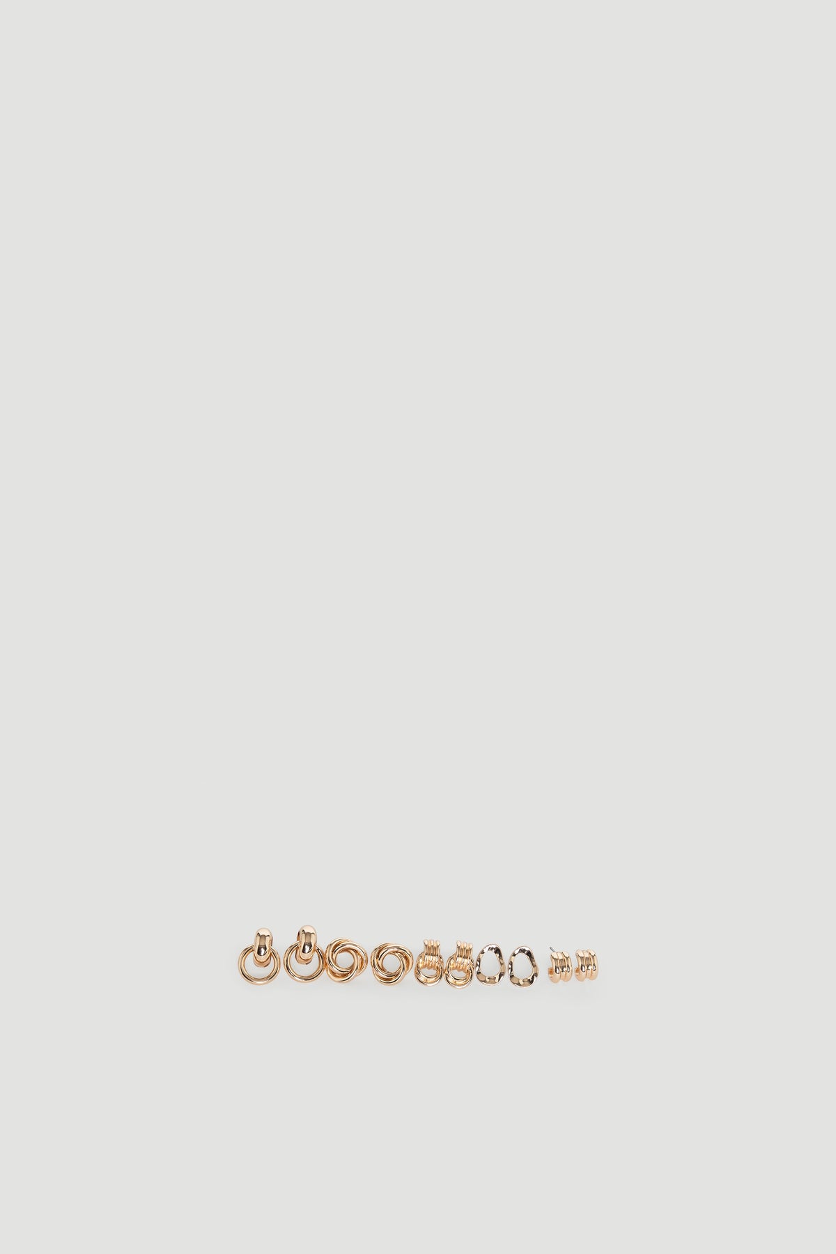 Eden Earring Multi Pack featuring assorted gold-tone and silver hoop and stud earrings for versatile everyday wear.