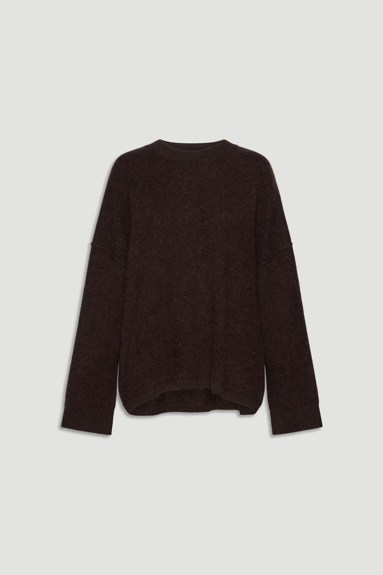 Cozy oversized dark brown wool knit sweater with relaxed fit and long sleeves for effortless everyday comfort.