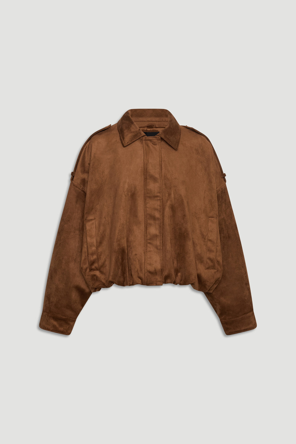 Cropped caramel brown faux suede jacket with a relaxed fit, classic collar, and long cuffed sleeves for versatile layering