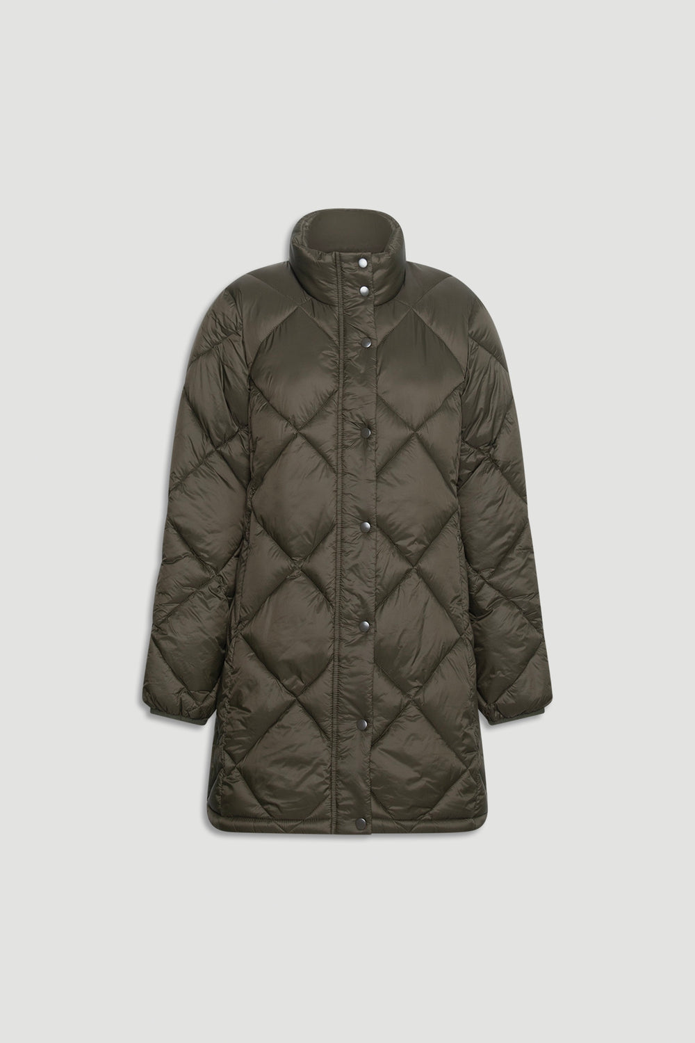 Longline forest green puffer jacket with quilted detailing and a high collar for a cozy winter outfit