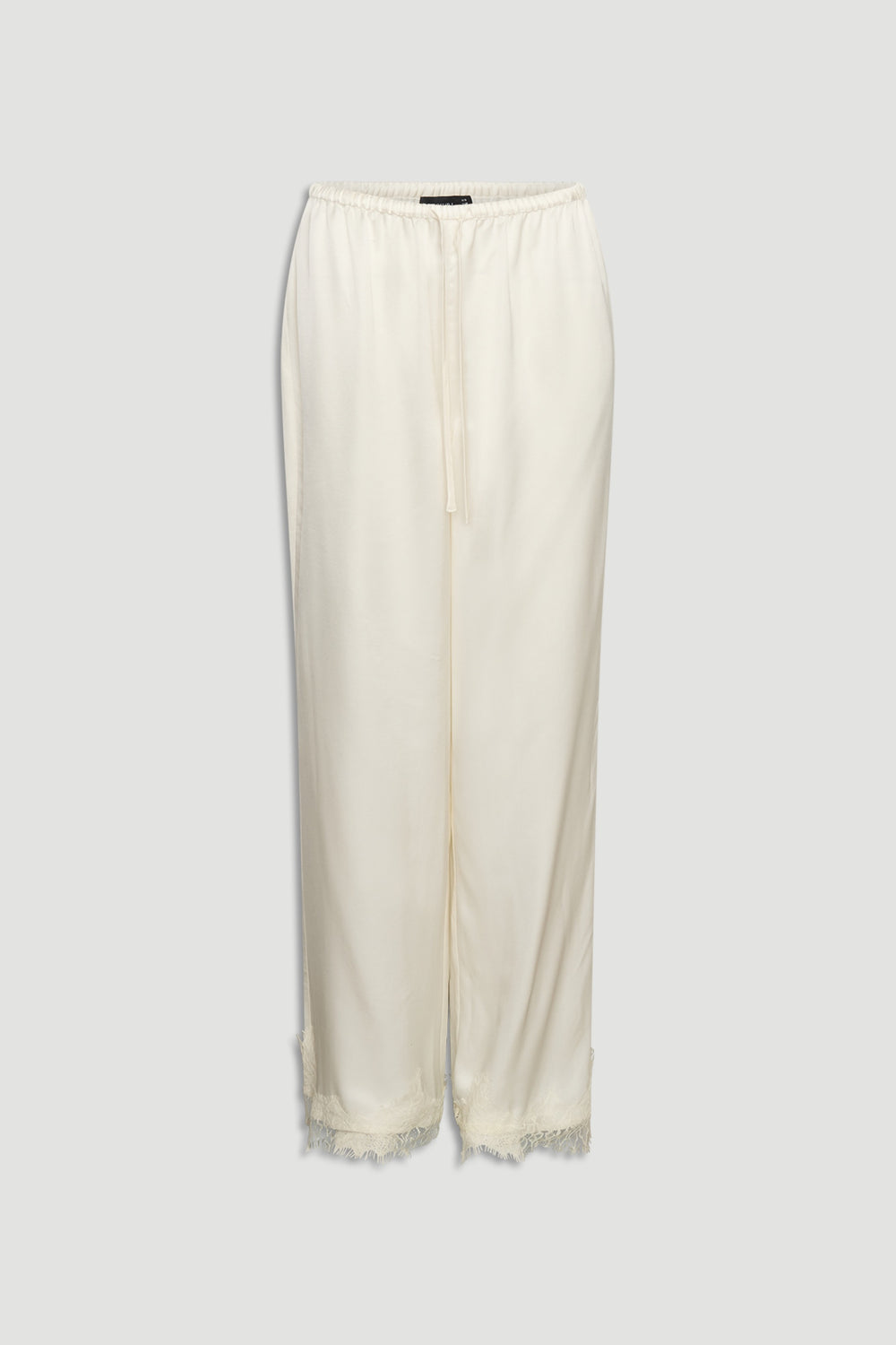 Ivory satin pants with delicate lace trim at the hem and a relaxed elastic waistband for comfort and style.