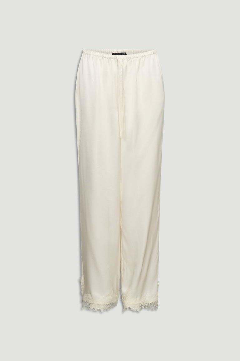 Ivory satin pants with delicate lace trim at the hem and a relaxed elastic waistband for comfort and style.