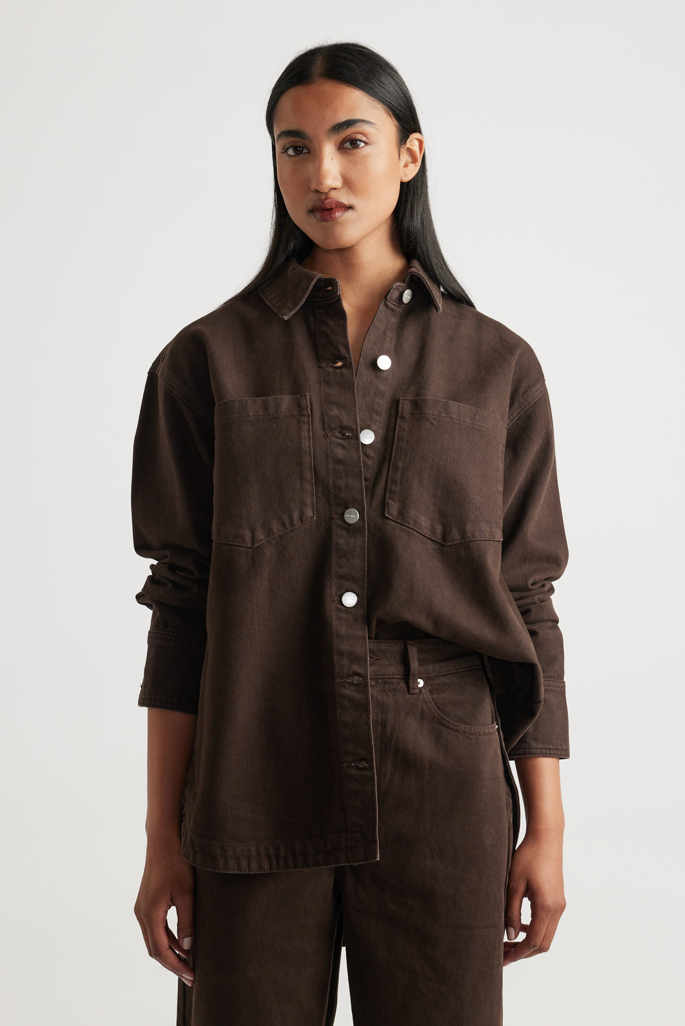 Ariana Denim Shirt in deep brown with button front and chest pockets styled with matching pants by Decjuba Australian brand