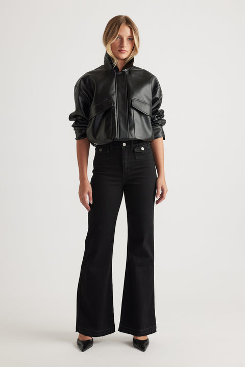 Bea Flare Jean in black denim with a high-rise waist and flared legs styled with a black leather jacket by DECJUBA Australian brand