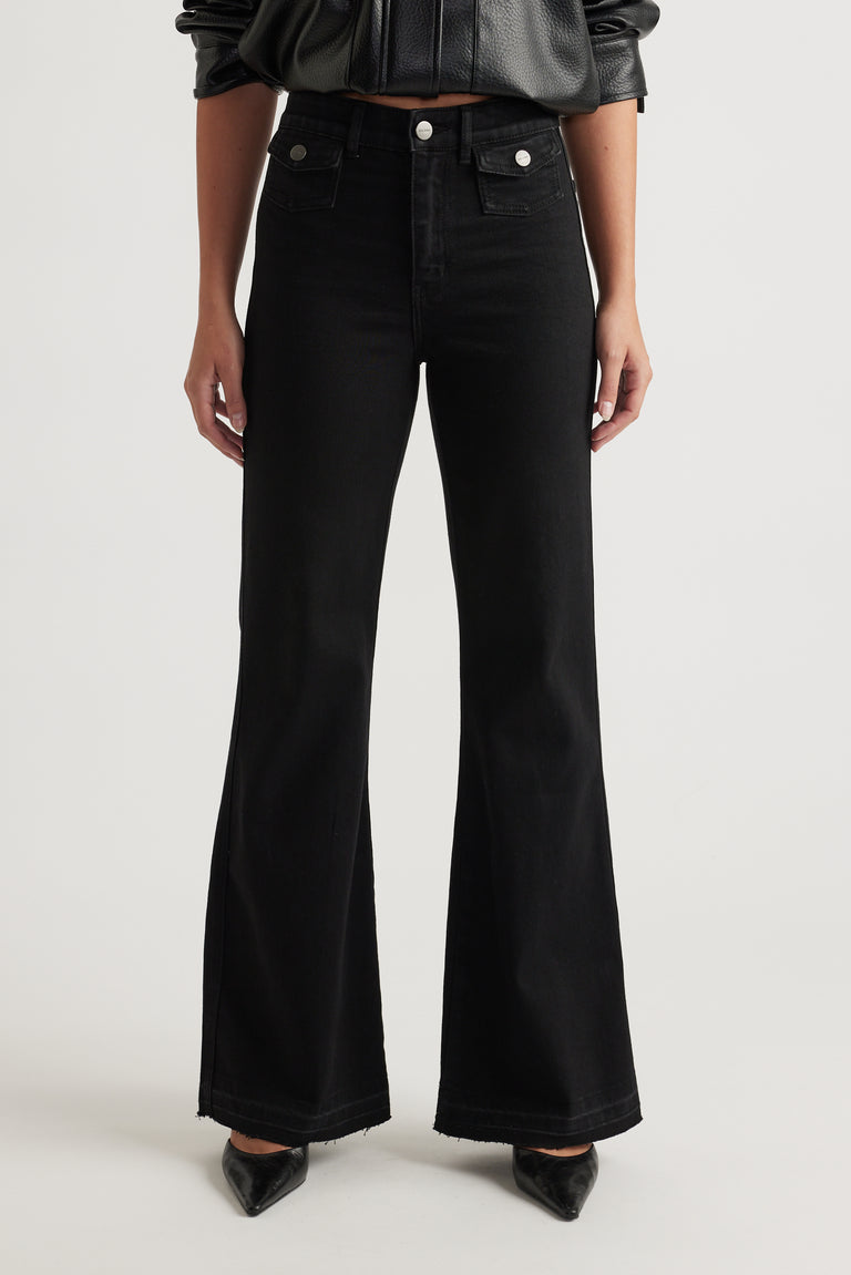Bea Flare Jean in black denim with high waist and wide flare leg styled with pointed toe shoes by DECJUBA Australian fashion brand