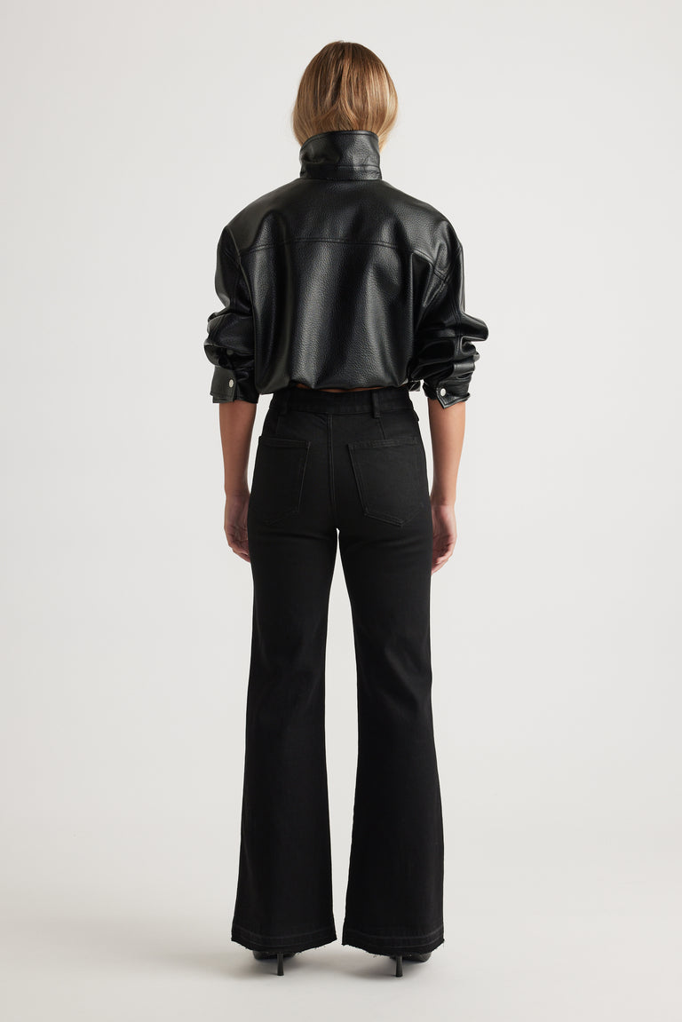 Bea Flare Jean in black denim with high waist and wide leg silhouette styled with a black leather jacket by DECJUBA Australian brand