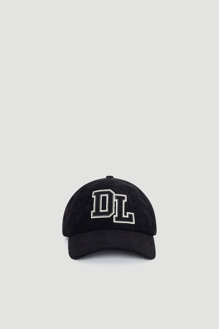 Black D-luxe Kim Cord Cap with textured cord fabric and contrasting embroidered "DL" logo for stylish everyday wear.
