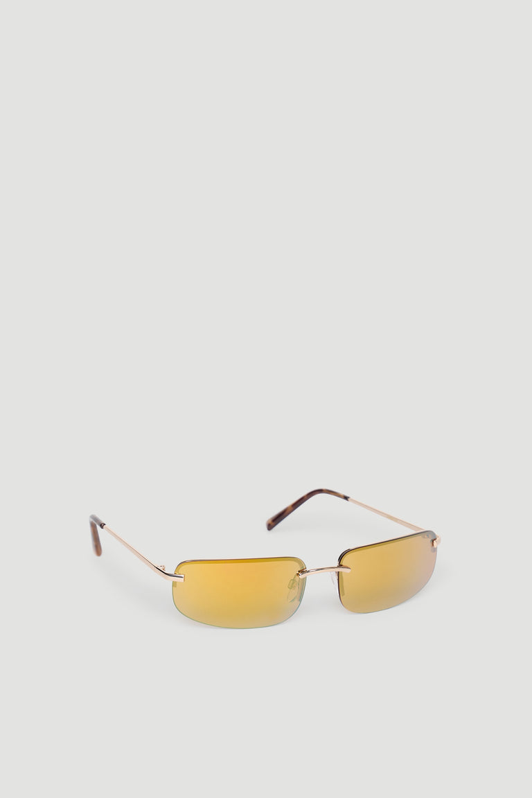 Slim rectangular sunglasses with gold-tinted lenses and thin metal frames for a sleek, modern look.