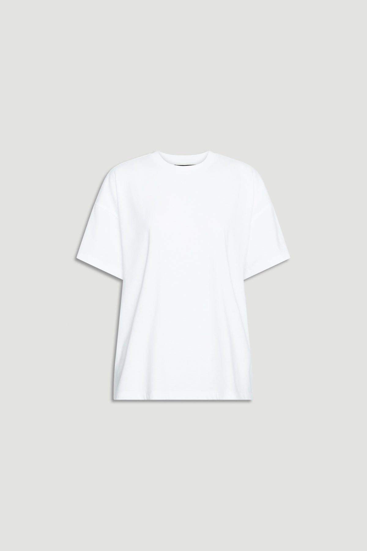 Relaxed fit white short sleeve tee with crew neckline offering a versatile and timeless casual wardrobe essential