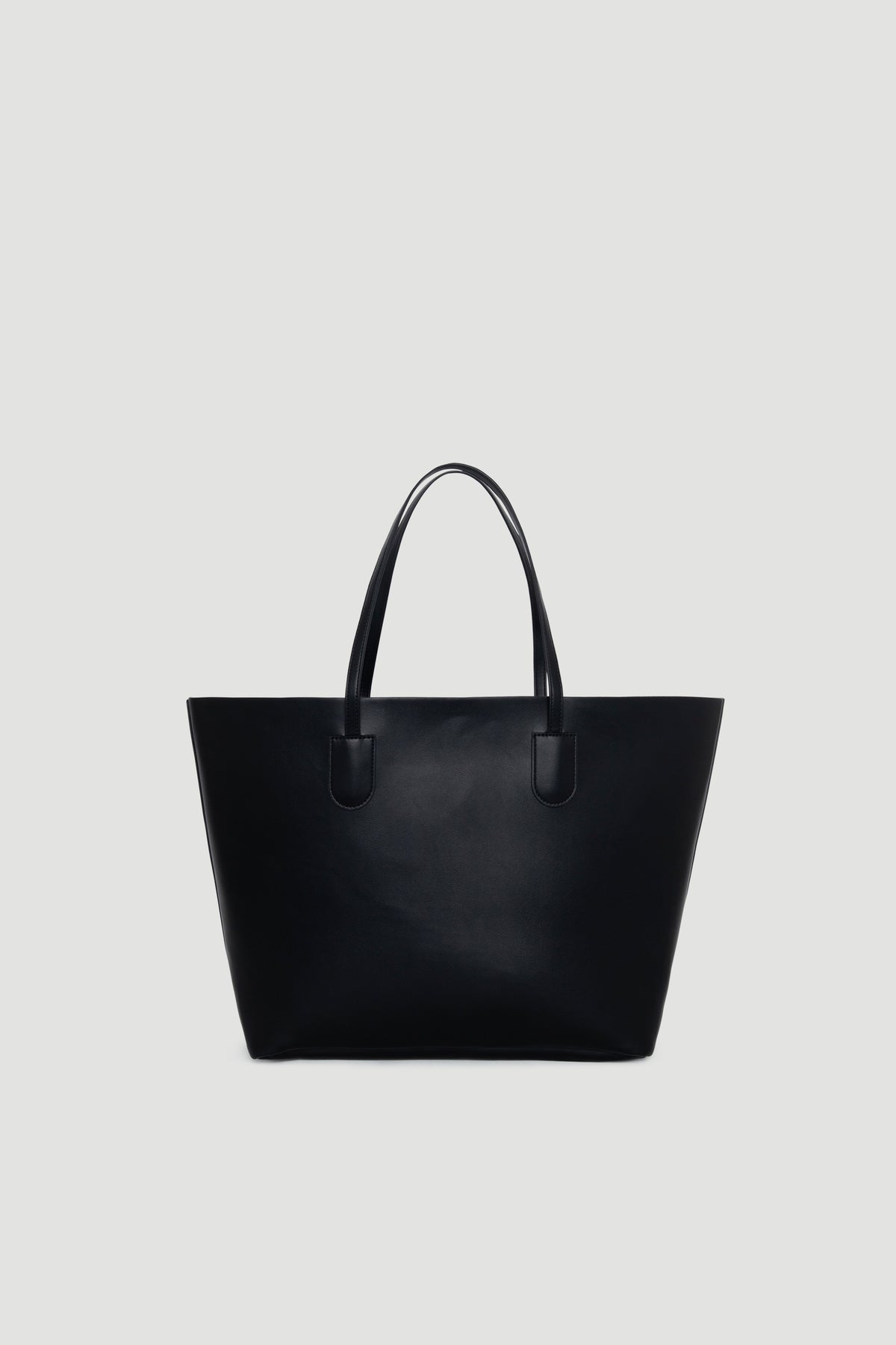 Simple and spacious black tote bag with smooth finish and sturdy handles, perfect for everyday use.