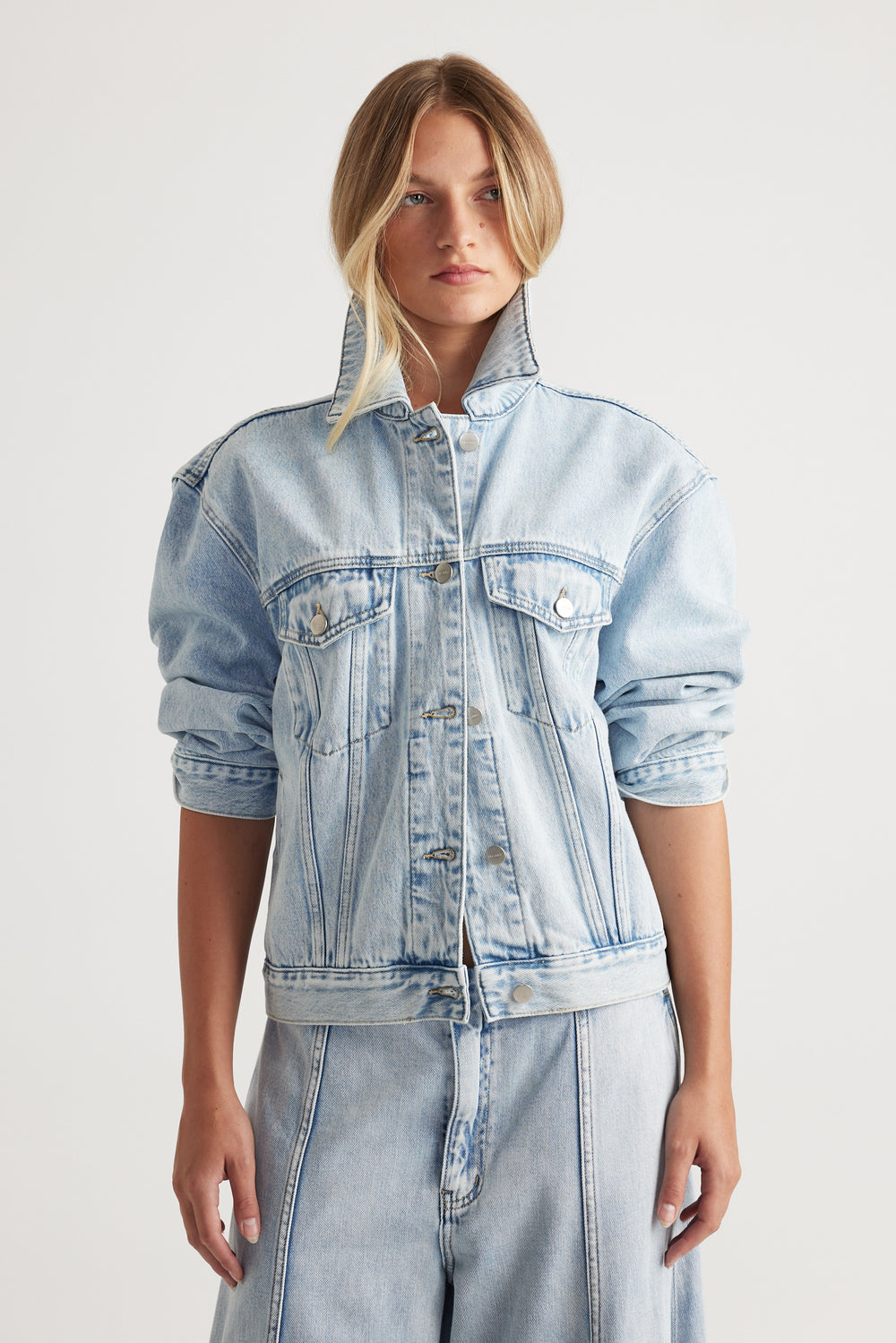 Nakita Denim Jacket in light wash with structured shoulders and relaxed fit by DECJUBA Australian fashion brand