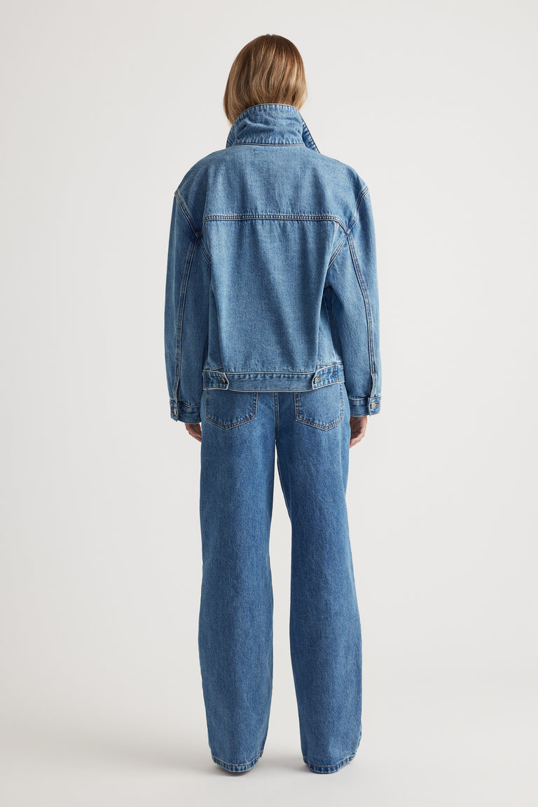 Nakita Denim Jacket in classic mid-blue wash with relaxed fit and high collar by DECJUBA Australian fashion brand