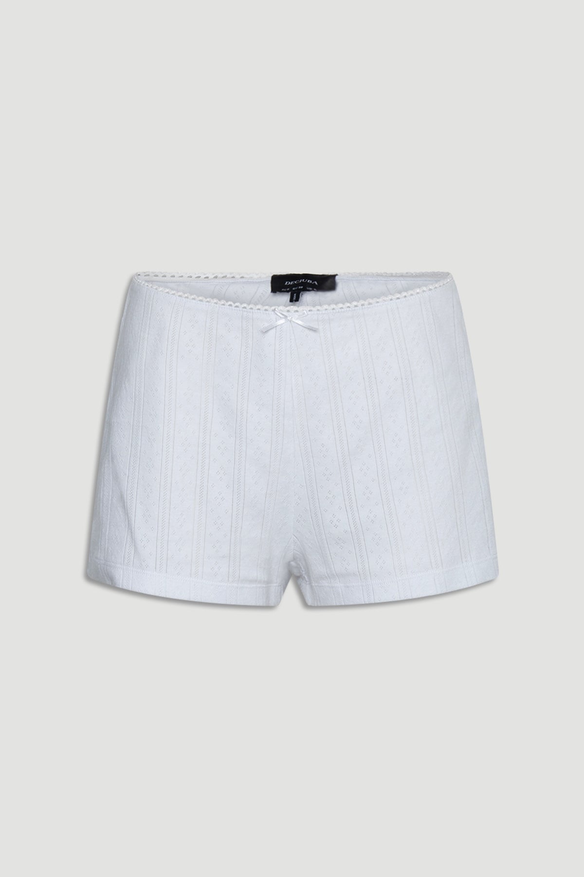 White textured pointelle shorts with delicate bow and soft knit fabric for comfortable loungewear fit