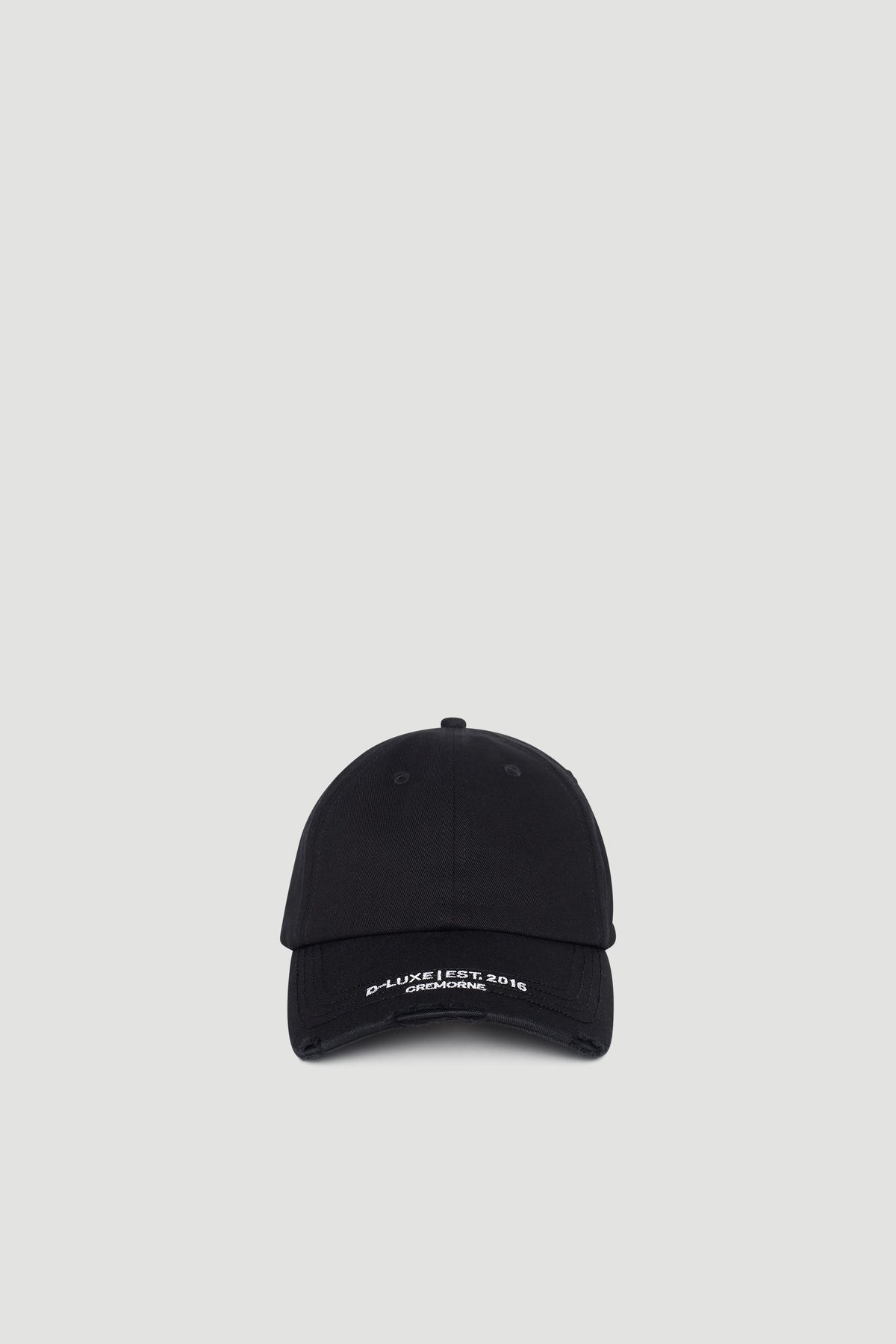 Black baseball cap with subtle distressed details and embroidered branding on the curved brim