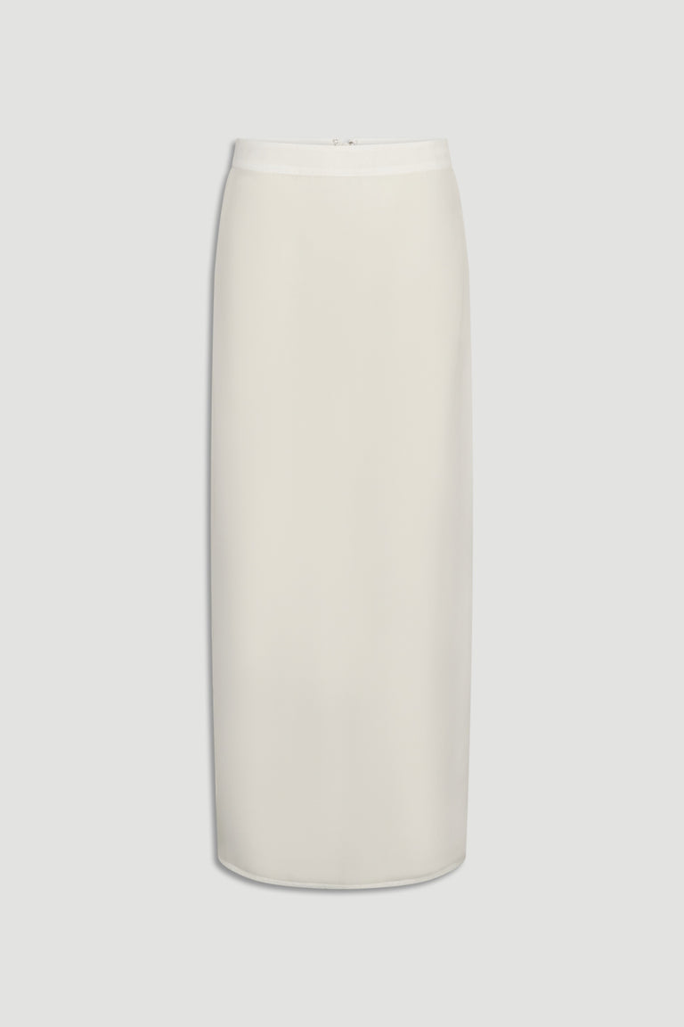 Creamy white maxi skirt with a smooth, sheer organza overlay and clean minimalist silhouette