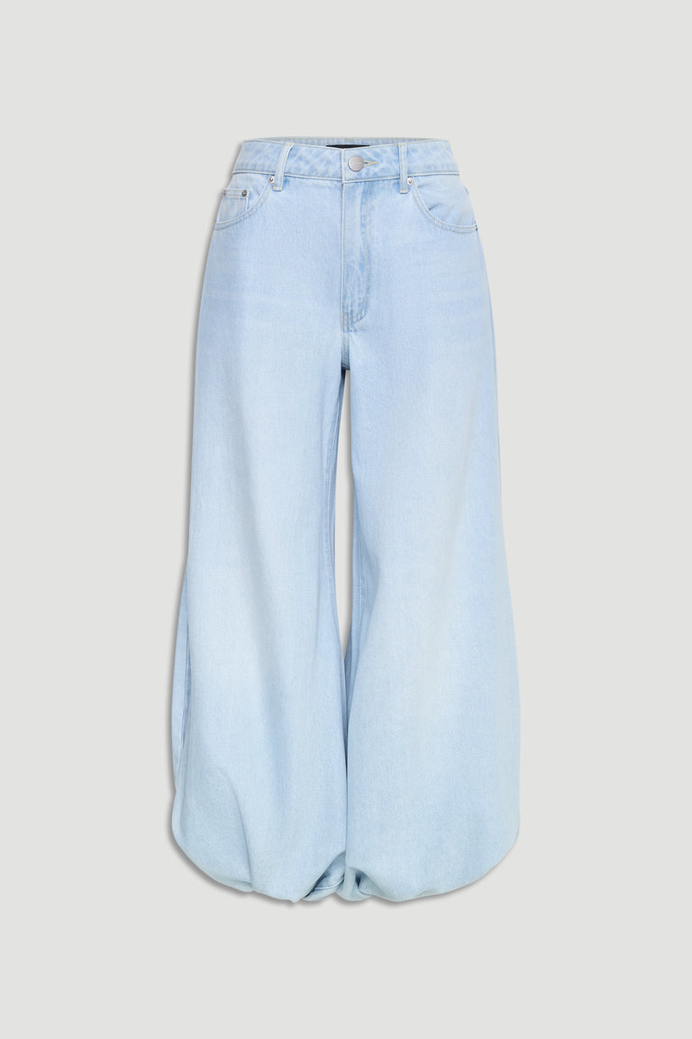 Light wash high-rise jeans with a balloon leg silhouette, featuring classic five-pocket styling for a relaxed yet stylish fit